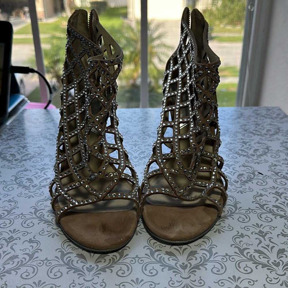 Well loved Michael Kors shoes. Bought at store. Used handful of times.